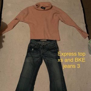 Express brand new sweater tags still on it with a pair of nice fitting jeans